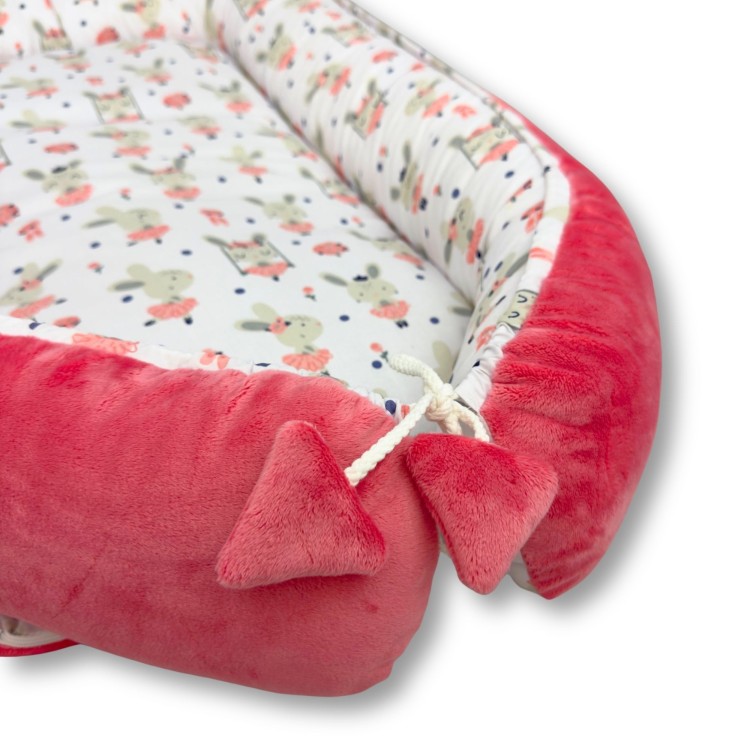 koralowy kokon dla noworodka przytulne gniazdko