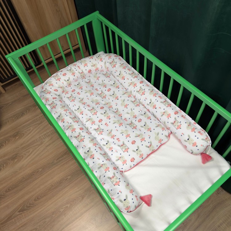 koralowy kokon dla noworodka przytulne gniazdko