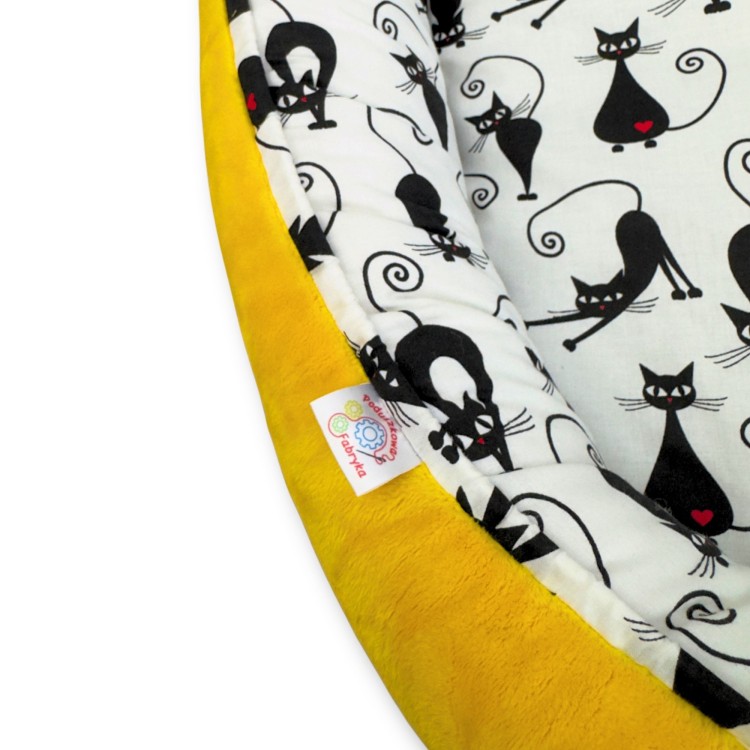 żółty kokon dla niemowlaka z miękkim wnętrzem